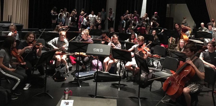 The SHS orchestra and choir rehearse for the annual Mosaic Concert.