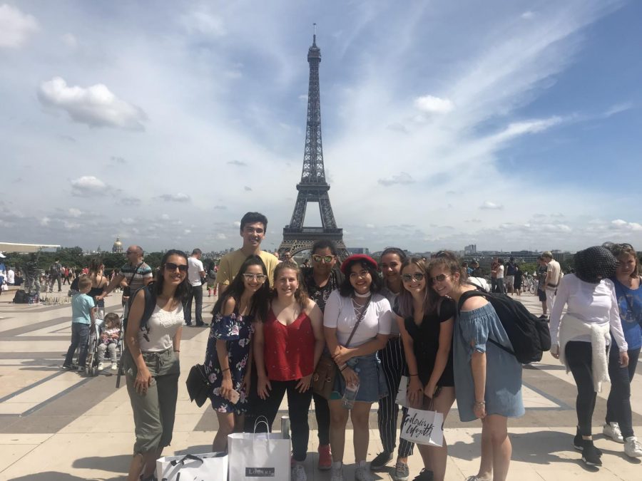 Students+pose+for+a+photo+at+the+Eiffel+Tower+in+Paris%2C+France+as+apart+of+the+foreign+exchange+program.+The+foreign+exchange+program+allows+students+to+travel+to+a+country+of+the+language+they+learned+throughout+the+years.