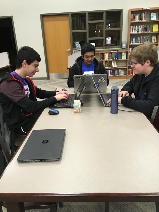 Brody+Adelman%2C+Pranay+Singh%2C+and+Gavin+Andres+code+in+the+Fremd+Media+Center+during+the+Code211+Hackathon.+