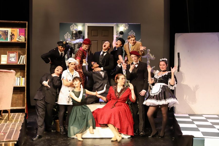 The cast of Clue pose for a pre-show photo. Clue ran November 21-23.