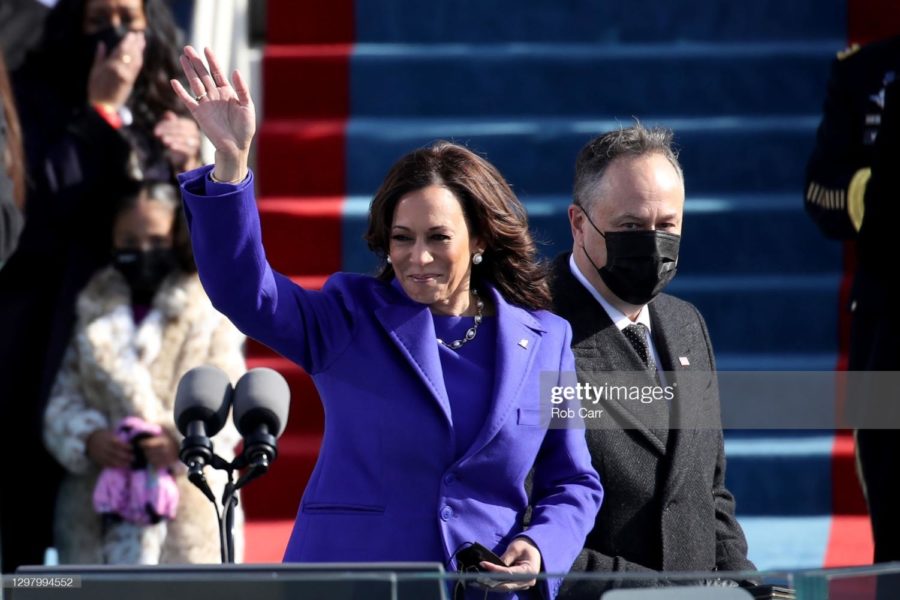Newly sworn in U.S. Vice President Kamala Harris and her husband Doug Emhoff wave at the gathered crowd.