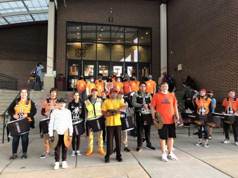 Members of the SHS drumline prepare for a Saxon Storm on Unity Day. 