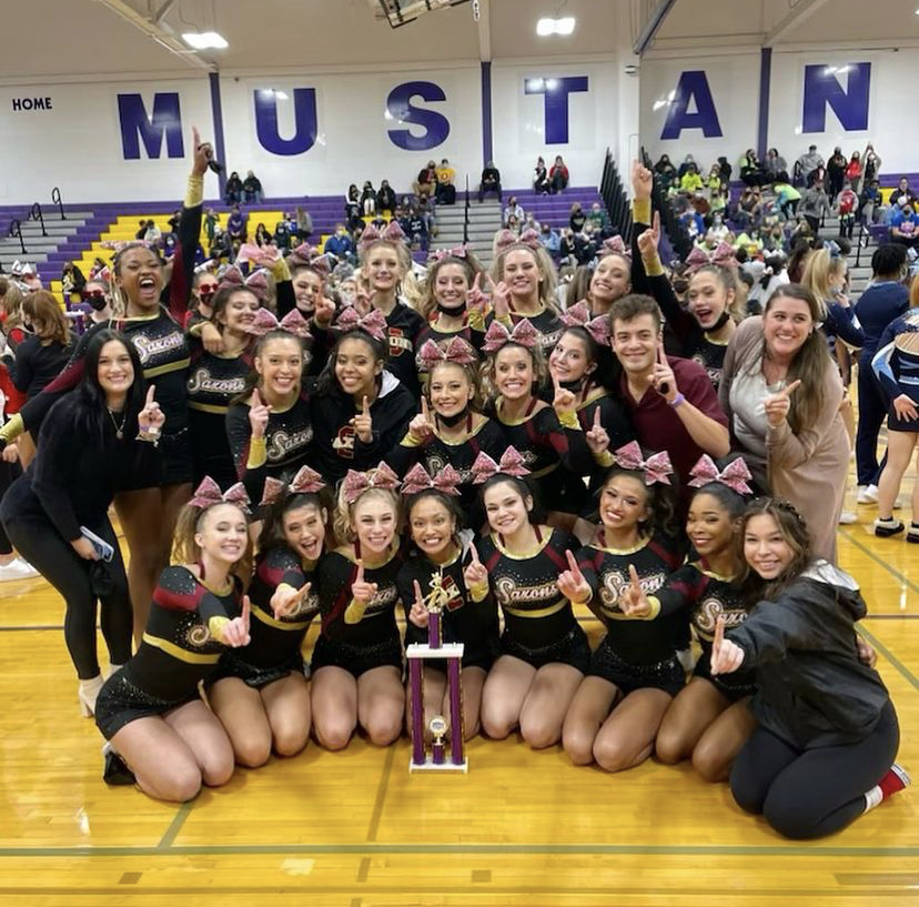The SHS Cheer team celebrates their first place finish at Rolling Meadows High School 