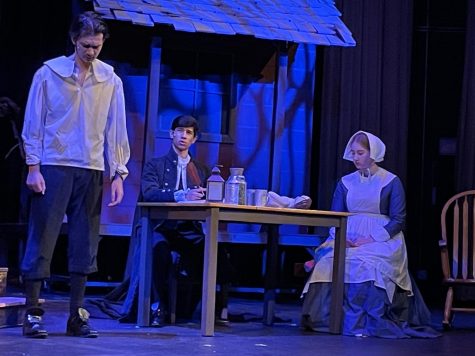 Chris Mininniti (left), Arion Peralta (center), and Emily Rose (right) in Schaumburg High Schools performance of Arthur Millers The Crucible. 