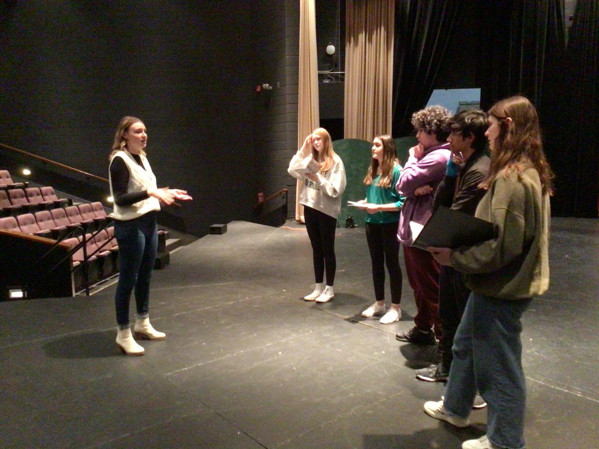Ms. Rysavy gives direction and notes to actors in this year’s fall play.
