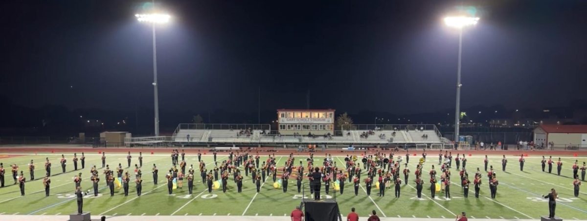 The Marching Band performs "Otherworldly" at a home football game. 