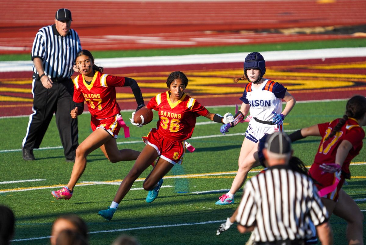 Saqqara Gibson carries the ball against Buffalo Grove. 