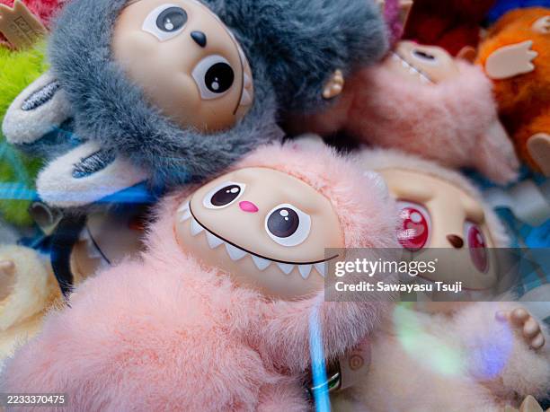 HONG KONG, CHINA - SEPTEMBER 02: Plush dolls Labubu are displayed inside a craw machine on September 2, 2025, in Hong Kong, China. (Photo by Sawayasu Tsuji/Getty Images)