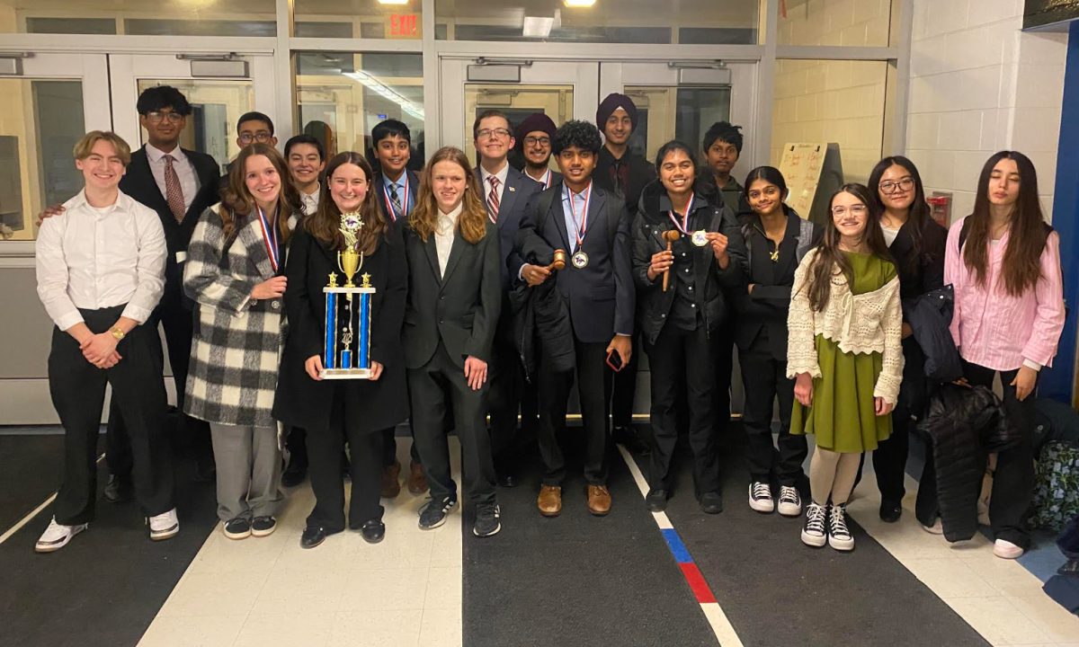 Debate Team Claims Sweepstakes Title at League Tournament